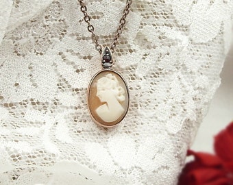 Vintage shell cameo pendant with accenting garnet in Silver rosegoldplated 210323d