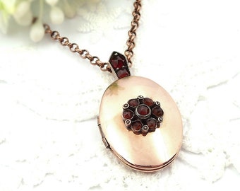 Vintage oval garnet locket pendant with chain included 231212g