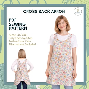 May include: A floral cross-back apron with a white background, blue, pink, and yellow flowers. The apron is shown on a person wearing a white shirt and jeans. The image also includes text that says "CROSS BACK APRON" and "PDF SEWING PATTERN".