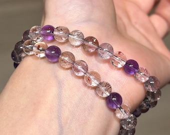 ¡Raro! Pulsera AAAA+ Super 7 de 6 mm con brillantes inclusiones naturales, máxima claridad y cristal de alta vibración para coleccionistas.