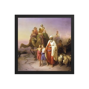 Può includere: Stampa incorniciata di un dipinto classico raffigurante una scena biblica. Un uomo con turbante bianco e veste rossa guida un gruppo di persone, tra cui bambini, cammelli e pecore. L'opera è ambientata in un paesaggio desertico con una tavolozza di colori caldi.