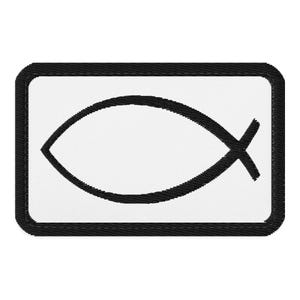 May include: A rectangular embroidered patch featuring a white background with a black border. Centered on the patch is a black stitched fish symbol, commonly known as an ichthys, which consists of two intersecting arcs forming a fish shape.