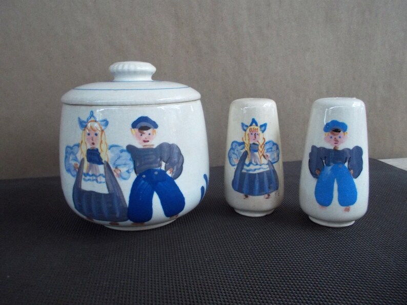 Vintage Handpainted Ceramic Dutch Boy and Girl Canister and Salt and Pepper Set