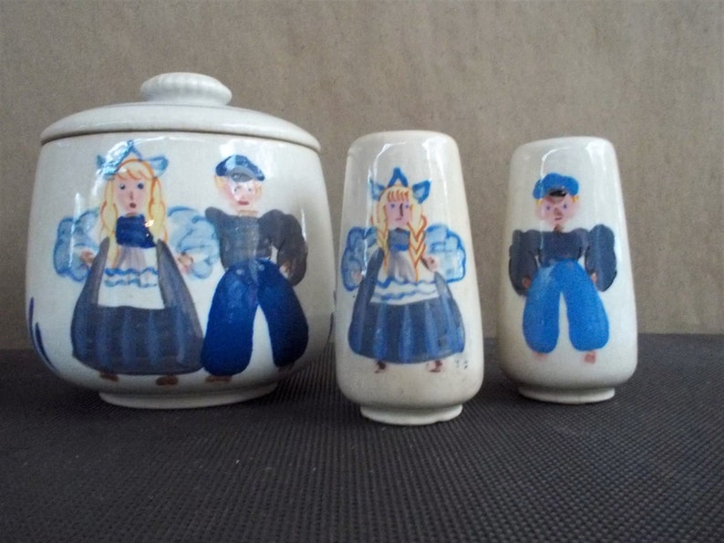 Vintage Handpainted Ceramic Dutch Boy and Girl Canister and Salt and Pepper Set