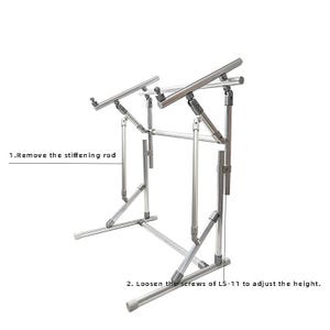 May include: A silver metal adjustable laptop stand with a tubular frame structure. The stand features two angled support arms and a base. Text on the image reads: 1. Remove the stiffening rod and 2. Loosen the screws of LS-11 to adjust the height.