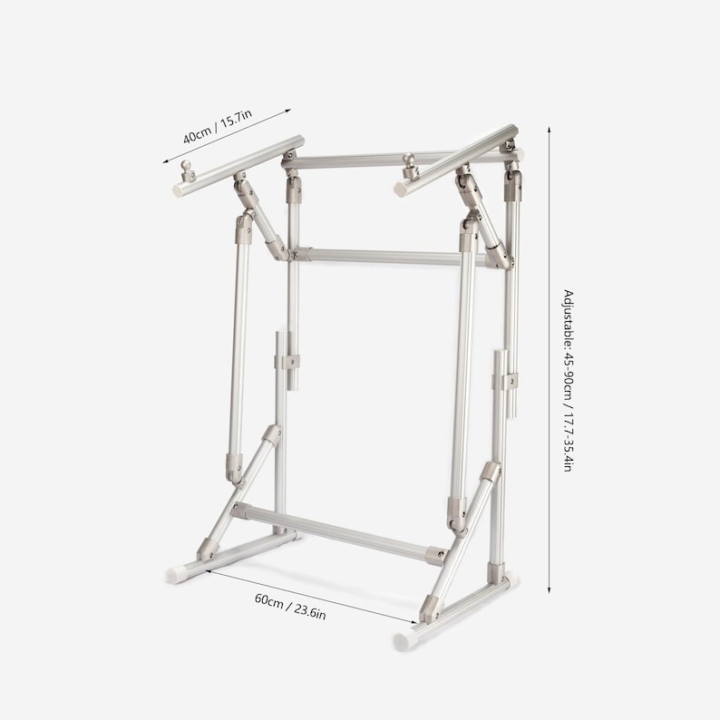May include: A silver metal adjustable stand featuring a frame with multiple joints and support bars. Dimensions are labeled as 40cm/15.7in wide, 60cm/23.6in deep, and an adjustable height ranging from 45-90cm/17.7-35.4in for the overall structure.