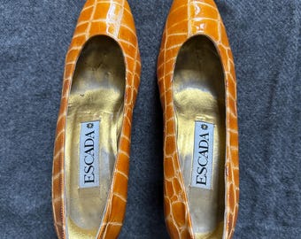 Vintage Escada patent leather orange reptile pumps. Size 7.5B. 2.75&quot; heel. Made in Italy.