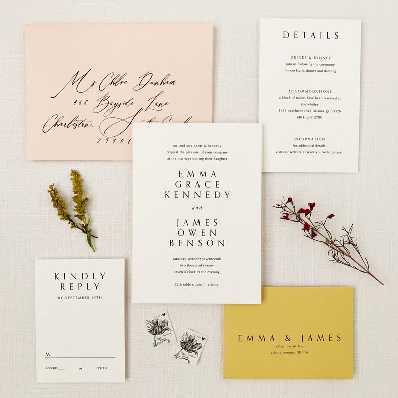 May include: A wedding invitation suite with a cream background. The invitation features the names Emma Grace Kennedy and James Owen Benson in a simple black font. The RSVP card is white with black text and a black line for the guest to write their name. The details card is white with black text and includes information about the wedding ceremony, reception, and accommodations. The save the date card is yellow with black text and features the names Emma & James.