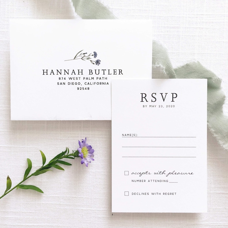 May include: RSVP card with a floral design. The card has a section for the guest's name, a checkbox to accept or decline the invitation, and a space to indicate the number of guests attending. The RSVP deadline is May 23, 2020.