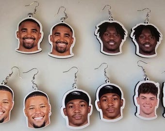 Pendientes colgantes con la cara de un jugador estrella de los Philadelphia Eagles