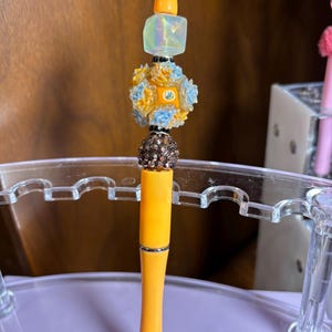 Orange flower beaded pen