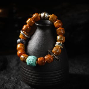 AURA HIRSCH Yak Knochen Talisman Armband mit Türkis Schnee Löwe Silber Vajra Perle