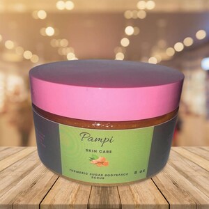 May include: A pink jar with a black label that says "Pampi Skin Care" and "Turmeric Sugar Body & Face Scrub 8 oz".