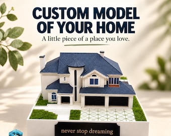 May include: A custom 3D model of a house with a dark blue roof and white walls, featuring a front driveway, green landscaping, and a black plaque at the base with the text "never stop dreaming" and the header "CUSTOM MODEL OF YOUR HOME".