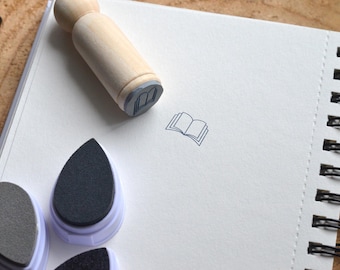 Sello de libro abierto. Sello de tinta de lectura de libro. Lector y sello escolar. sello de libro