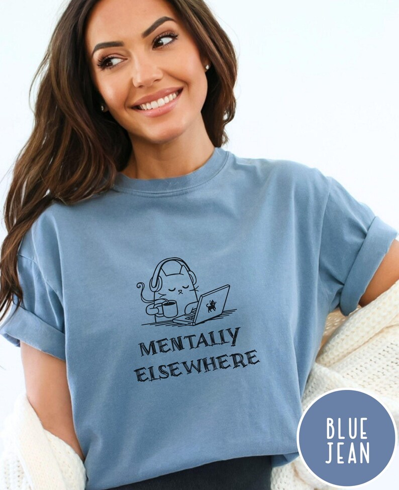 Comfort Colors brain fog t-shirt with minimalist cat illustration and text Mentally Elsewhere