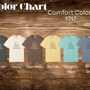 May include: Color chart of Comfort Colors 1717 t-shirts in various colors: Pepper, Ivory, Espresso, Butter, Chalky Mint, and Blue Jean. Each shirt features a graphic and the text "Mentally Elsewhere."