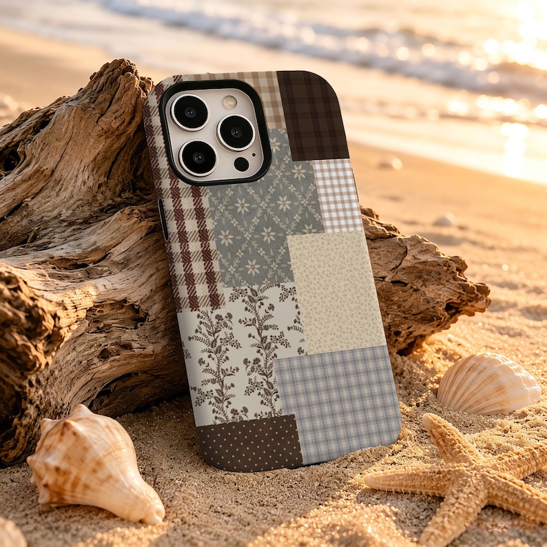 Bring a cozy vintage touch to your everyday style with this patchwork phone case, featuring a charming mix of brown plaid, beige gingham, soft blue checks, tiny florals, and botanical prints. The muted neutral palette creates a warm cottagecore mood with a handmade quilt-inspired feel. Perfect for daily use, school, work, or travel, it also makes a thoughtful birthday, holiday, or just-because gift for vintage lovers, cottagecore fans, teens, and friends.