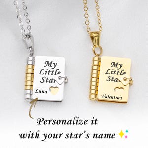 May include: Two pendant necklaces, one silver and one gold, each with a small book-shaped charm. The charms read "My Little Star" and have a heart cutout. The silver necklace is engraved with "Luna", and the gold one with "Valentina".