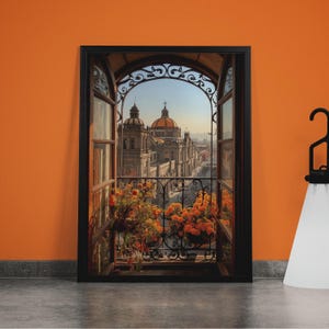 May include: Framed artwork depicting a view from a balcony overlooking a city with a cathedral. The artwork features an open window with a wrought iron railing and potted orange flowers. The city has multiple buildings with domes.