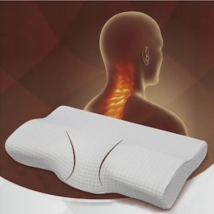 May include: A white memory foam pillow with a contoured shape and textured surface. The pillow has two curved indentations and is designed for neck support. The background shows a person's silhouette with a neck illustration.