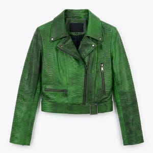 May include: A vibrant green biker jacket featuring a textured snakeskin-like pattern, a wide notched collar with silver-tone metal snaps, an asymmetrical front zip closure, two zipped chest pockets, and a buckled belt at the waist hem.