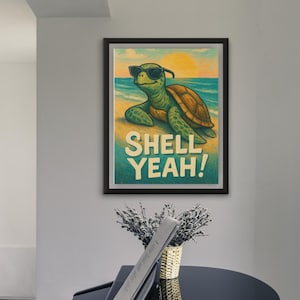 May include: Framed art print featuring a cartoon turtle wearing sunglasses on a beach with the text "SHELL YEAH!". The turtle has a green body and a brown shell, set against a blue ocean and a yellow sunset.