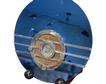 Radio original Art Déco Sparton 'Bluebird' con espejo azul cobalto modelo 566 de los años 30 diseñada por Walter Dorwin Teague