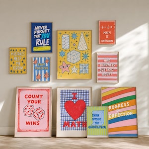 May include: A collection of ten rectangular wall art prints featuring maths-themed illustrations and motivational text. The designs include geometric shapes, dice, hearts, and stripes in vibrant colours like yellow, blue, pink, and orange with bold typography.