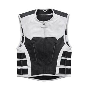 May include: A white and black motorcycle vest with a round collar and a zipper closure. The vest features a mesh panel on the front and three adjustable straps on the lower front. The vest is designed for protection and style.