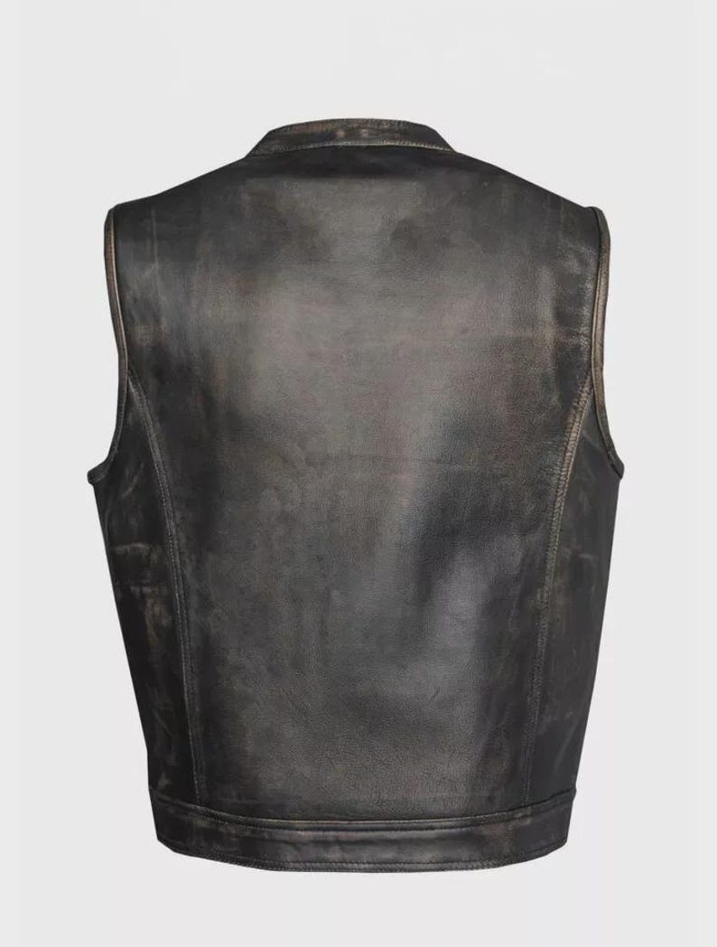 May include: A distressed black leather vest with a stand-up collar. The vest has a worn, vintage appearance with visible texture and subtle color variations. The back view showcases the vest's tailored design and stitching details. A classic piece of outerwear.