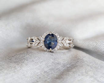 Anillo de plata 925 con filigrana y halo de zafiro