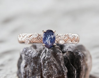 Anillo ajustable de plata 925 con pluma de zafiro azul