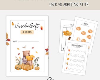 May include: A preschool workbook titled VORSCHULHEFT HERBST with over 40 worksheets. The cover features a bear reading a book while sitting on a pumpkin, surrounded by autumn leaves. Additional pages show counting exercises with pumpkins and tracing lines.