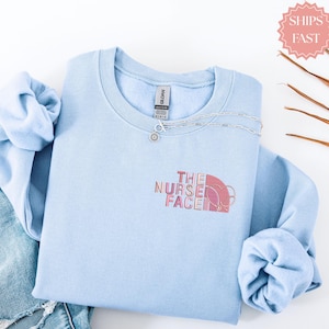 Embroidered The Nurse Face Sweatshirt, Nurse Week, Nurse gifts, Nurse Sweatshirt, Gift for Her, Gift for Nurse, Nurse Graduation Sweatshirt