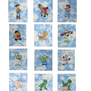 May include: A grid of twelve rectangular patches featuring embroidered Toy Story characters against a light blue sky with white clouds. The characters include Woody, Bullseye, Jessie, Mr. Potato Head, Slinky Dog, Buzz Lightyear, an alien, and Forky.