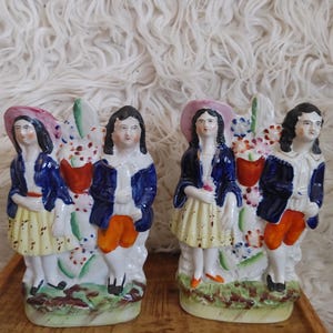 A pair Antique Staffordshire figurine