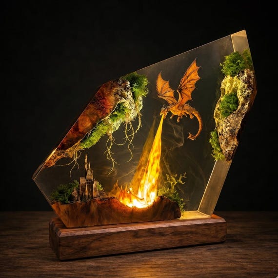 A handcrafted resin-and-wood lamp with a fire dragon diorama trapped inside — it literally glows like a dragon's lair when lit.