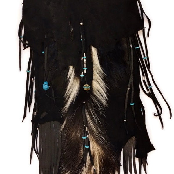 Skunk possibles bag.  Skunk fur and tail. Mountain man. Pow wow.  Boho.  Hippie.  Black deer skin