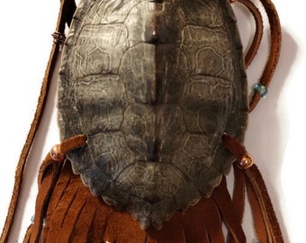 Map turtle Shell medicine bag.  Tobacco leather suede out.  Small 4 1/2"x3 1/4" shell.  Renaissance Faire rendezvous