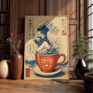 Peut inclure: Une affiche encadrée représentant une tasse de café rouge avec le texte "Hokusai Coffee Japan Blend" et un motif de vague bleue. Du texte japonais est également présent. L'œuvre est sur fond beige avec un cadre en bois.