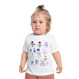 Winter Wonderland Schneemann Baby T-Shirt, süßes frostiges Schneemann T-Shirt, Säugling Urlaub Shirt, Weihnachtsgeschenk, Winterbekleidung, Spaß Kinderkleidung