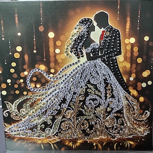 May include: A romantic image of a couple embracing, silhouetted against a bokeh background. The woman's dress is adorned with sparkling embellishments, and the man wears a suit with a red tie. The artwork features gold and silver tones.
