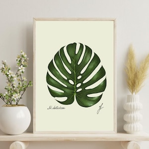 Monstera print on a white shelf next to two white vases and a white background