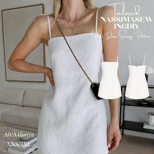 Puede incluir: Vestido lencero blanco de lino con tirantes finos. El vestido se muestra en una persona y también como un patrón de costura. El texto en la imagen dice "Tailored NassimaseW IngDIY Shirt Dress Sewing Pattern" y "A0/A4forma XXS/3XL".
