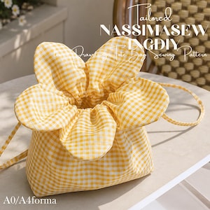 May include: A yellow and white gingham drawstring tote bag with a flower-shaped top. The bag has a rounded base and a drawstring closure. The text "Tailored NASSIMASEW INGDIY Drawing Tote Bag Sewing Pattern" is visible.