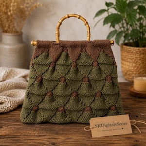 May include: A handmade, knitted handbag with a bamboo handle. The bag features a geometric pattern in shades of olive green and brown. The tag reads "SKDigitalsStore - Handmade with love".
