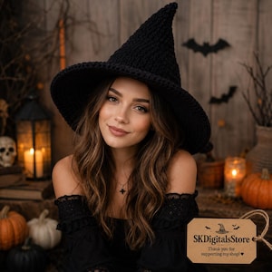May include: A black crocheted witch hat with a pointed crown and a wide, circular brim. The hat features a textured, yarn-based construction and is worn on the head. A rectangular tan tag with the text SKDigitalsStore is attached to the side.