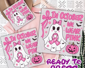 May include: Pink and white graphic design with the text "In October We Wear Pink" featuring a ghost with a pink ribbon, bats, and a jack-o'-lantern. The words "Ready to Press" are also visible.