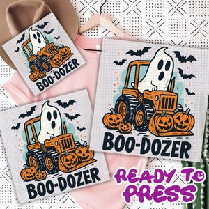 May include: Halloween-themed design featuring a ghost driving an orange bulldozer with jack-o'-lanterns. The text "BOO-DOZER" is below the image. Bats are flying in the background. The words "READY TO PRESS" are also visible.